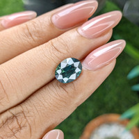 3.13 Ct. Greenish Blue Sapphire from Madagascar Life Style