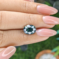 3.13 Ct. Greenish Blue Sapphire from Madagascar Life Style