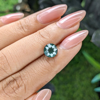 2.52 Ct. Bluish Green Sapphire from Madagascar Life Style