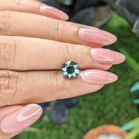 2.72 Ct. Bluish Green Sapphire from Madagascar Life Style