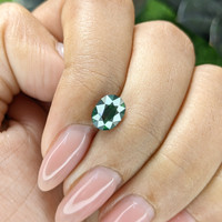1.72 Ct. Bluish Green Sapphire from Madagascar Life Style