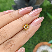 1.30 Ct. Orangish Yellow Sapphire from Madagascar Life Style