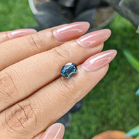 2.03 Ct. Greenish Blue Sapphire from Madagascar Life Style