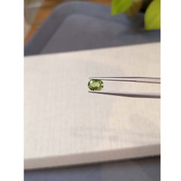 0.95 Ct. Yellowish Green Sapphire from Ceylon (Sri Lanka) Life Style