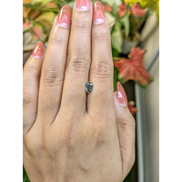0.76 Ct. Yellowish Green Sapphire from Ceylon (Sri Lanka) Life Style