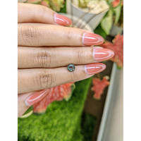 0.97 Ct. Green Sapphire from Ceylon (Sri Lanka) Life Style