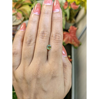 0.77 Ct. Yellowish Green Sapphire from Ceylon (Sri Lanka) Life Style