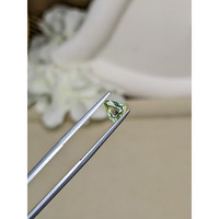 0.74 Ct. Yellowish Green Sapphire from Ceylon (Sri Lanka) Life Style