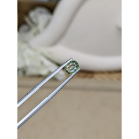 0.95 Ct. Yellowish Green Sapphire from Ceylon (Sri Lanka) Life Style