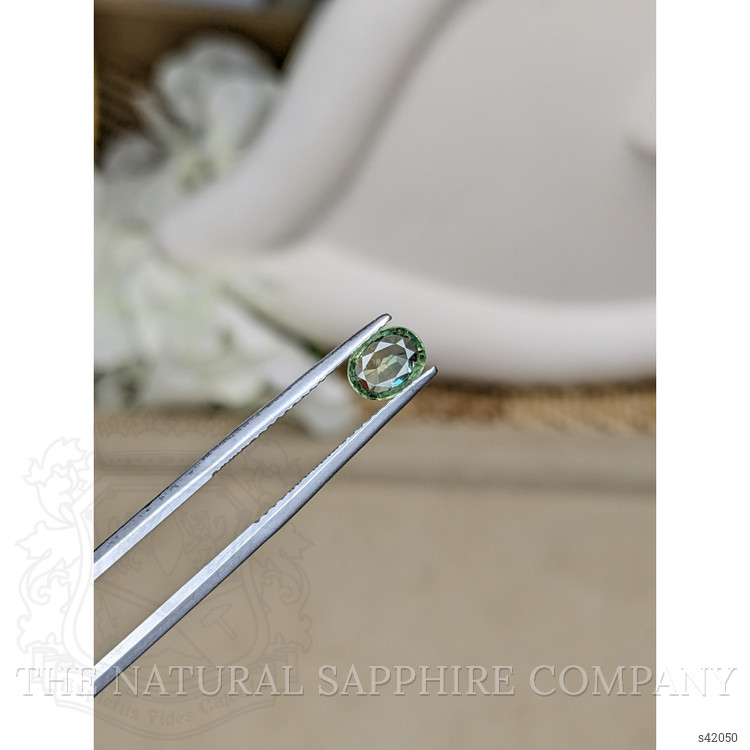0.95 Ct. Yellowish Green Sapphire from Ceylon (Sri Lanka)