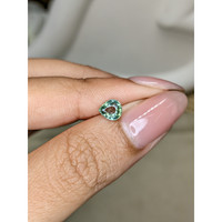 0.77 Ct. Bluish Green Sapphire from Ceylon (Sri Lanka) Life Style