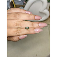 0.90 Ct. Yellowish Green Sapphire from Ceylon (Sri Lanka) Life Style