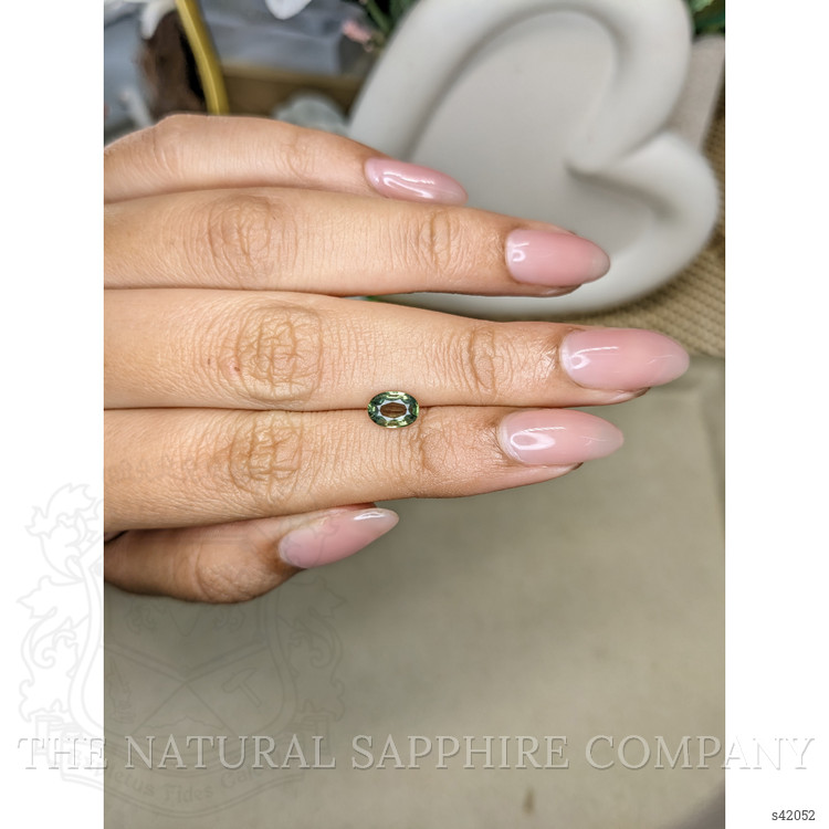 0.90 Ct. Yellowish Green Sapphire from Ceylon (Sri Lanka)