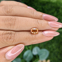 1.47 Ct. Orange Sapphire from Madagascar Life Style