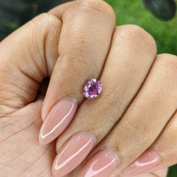 0.84 Ct. Purplish Pink Sapphire from Madagascar Life Style