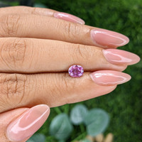 0.84 Ct. Purplish Pink Sapphire from Madagascar Life Style