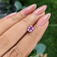 0.84 Ct. Purplish Pink Sapphire from Madagascar Life Style