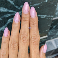 0.21 Ct. Purplish Pink Sapphire from Ceylon (Sri Lanka) Life Style