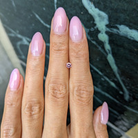 0.22 Ct. Reddish Pink Sapphire from Ceylon (Sri Lanka) Life Style