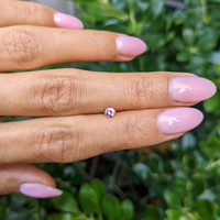 0.22 Ct. Reddish Pink Sapphire from Ceylon (Sri Lanka) Life Style