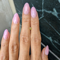 0.23 Ct. Yellowish Green Sapphire from Ceylon (Sri Lanka) Life Style
