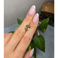 5.21 Ct. Yellowish Green Sapphire from Madagascar Life Style