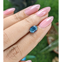 1.62 Ct. Greenish Blue Sapphire from Madagascar Life Style