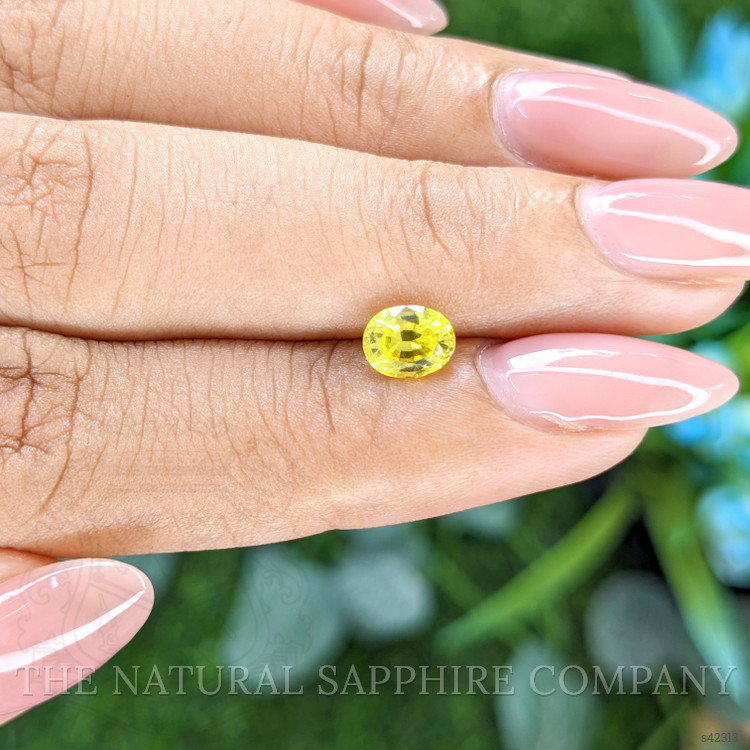 0.97 Ct. Greenish Yellow Sapphire from Tanzania