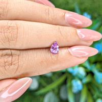 0.62 Ct. Pinkish Purple Sapphire from Tanzania Life Style