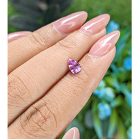 0.62 Ct. Pinkish Purple Sapphire from Tanzania Life Style