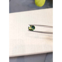 2.84 Ct. Bluish Green Sapphire from Thailand Life Style