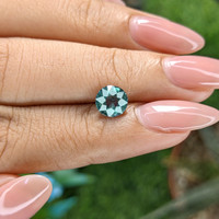 1.52 Ct. Bluish Green Sapphire from Madagascar Life Style