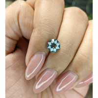 1.52 Ct. Bluish Green Sapphire from Madagascar Life Style