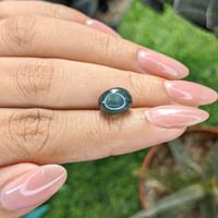 4.60 Ct. Bluish Green Cabochon Sapphire from Madagascar Life Style