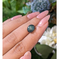 4.60 Ct. Bluish Green Cabochon Sapphire from Madagascar Life Style