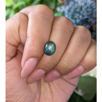 4.60 Ct. Bluish Green Cabochon Sapphire from Madagascar Life Style