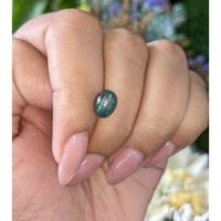 4.60 Ct. Bluish Green Cabochon Sapphire from Madagascar Life Style