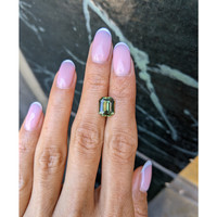 3.53 Ct. Yellowish Green Sapphire from Madagascar Life Style