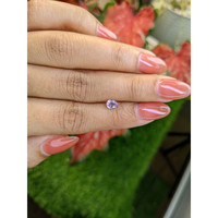 0.48 Ct. Pinkish Purple Sapphire from Ceylon (Sri Lanka) Life Style