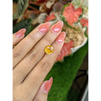 3.67 Ct. Yellowish Orange Sapphire from Ceylon (Sri Lanka) Life Style