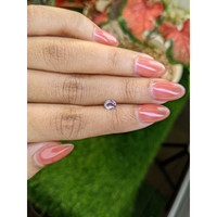 0.41 Ct. Pinkish Brown Sapphire from Ceylon (Sri Lanka) Life Style