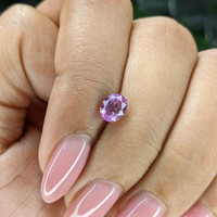 0.91 Ct. Pinkish Purple Sapphire from Tanzania Life Style