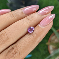 0.91 Ct. Pinkish Purple Sapphire from Tanzania Life Style