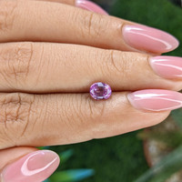 0.91 Ct. Pinkish Purple Sapphire from Tanzania Life Style