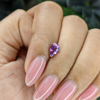 0.97 Ct. Pinkish Purple Sapphire from Tanzania Life Style