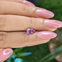 0.97 Ct. Pinkish Purple Sapphire from Tanzania Life Style