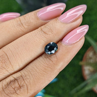 1.70 Ct. Bluish Green Sapphire from Tanzania Life Style