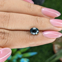 1.70 Ct. Bluish Green Sapphire from Tanzania Life Style