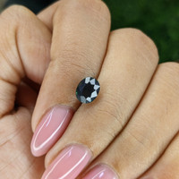 1.70 Ct. Bluish Green Sapphire from Tanzania Life Style