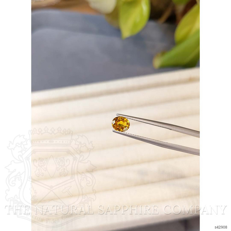 0.97 Ct. Orangish Yellow Sapphire from Thailand